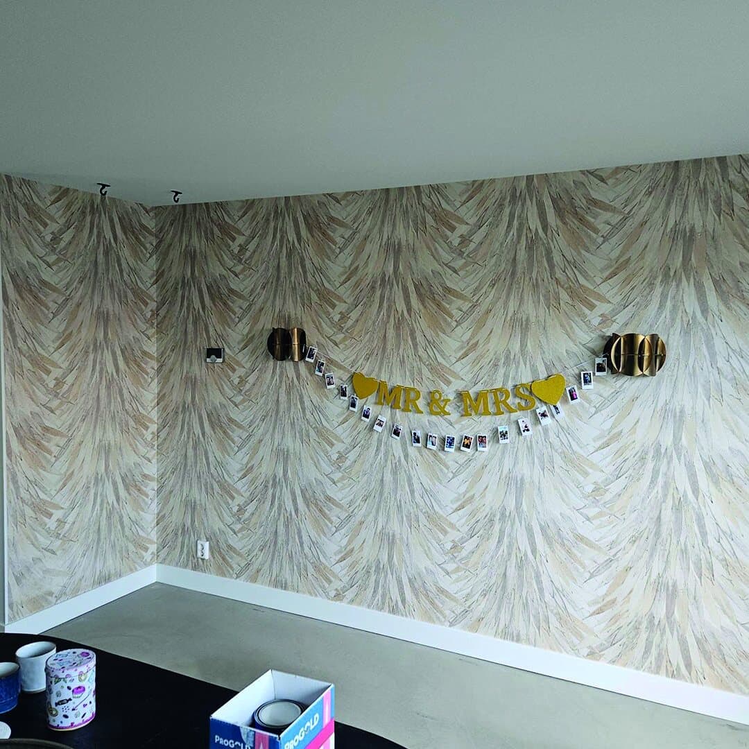 Designbehang met bladmotief